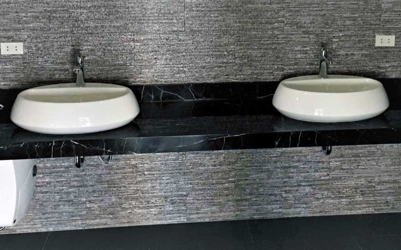 stylish double sinks with high quality wall tiles